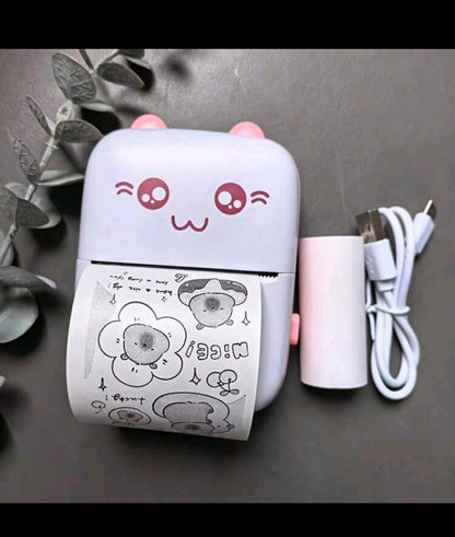 Portable inkless mini printer connected to a smartphone over Bluetooth